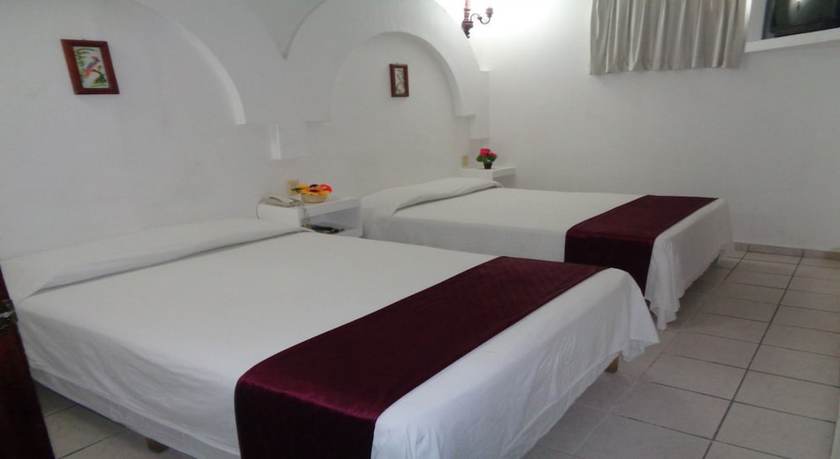 Imagen de la habitación del Hotel Boutique Esmeralda. Foto 3