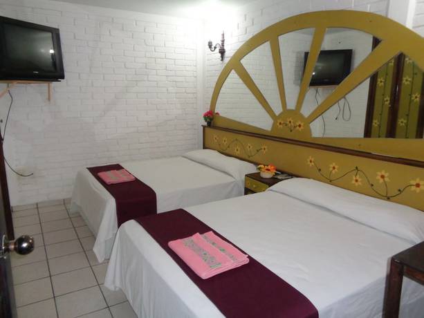 Imagen de la habitación del Hotel Boutique Esmeralda. Foto 12