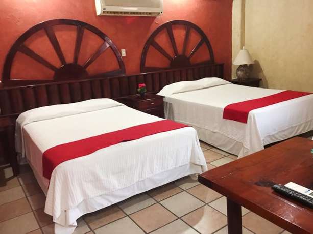 Imagen de la habitación del Hotel Boutique Esmeralda. Foto 14