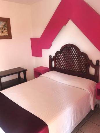 Imagen de la habitación del Hotel Boutique Esmeralda. Foto 15