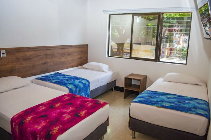 Imagen de la habitación del Hotel Boutique Estadio Medellin. Foto 9