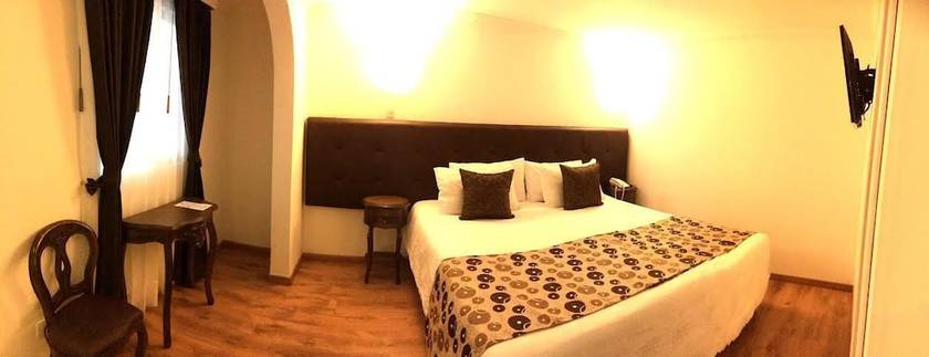 Imagen de la habitación del Hotel Boutique Feria Internacional. Foto 3