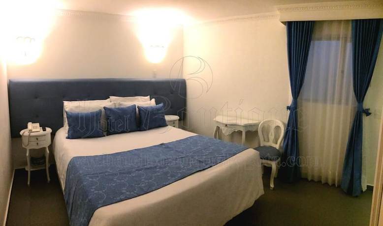 Imagen de la habitación del Hotel Boutique Feria Internacional. Foto 7