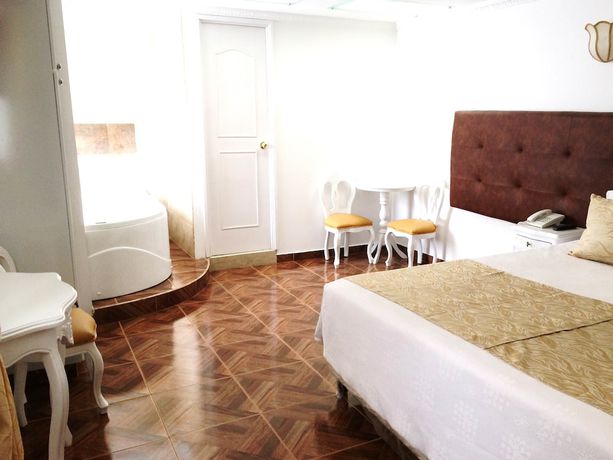 Imagen de la habitación del Hotel Boutique Feria Internacional. Foto 8