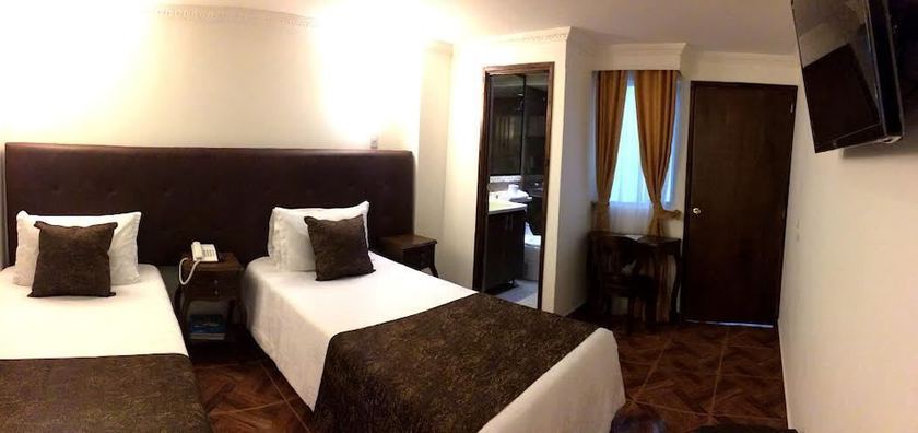 Imagen de la habitación del Hotel Boutique Feria Internacional. Foto 9