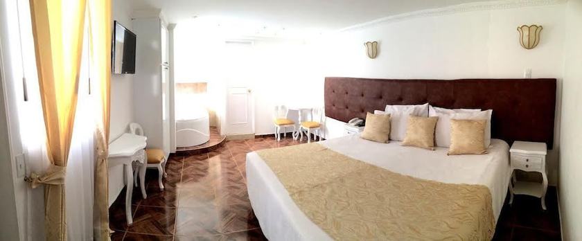 Imagen de la habitación del Hotel Boutique Feria Internacional. Foto 10