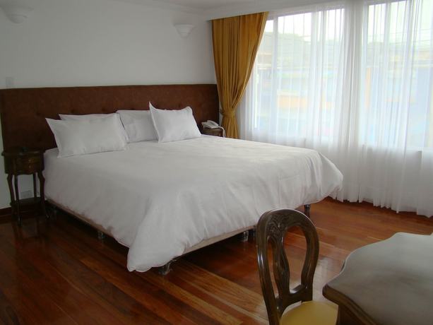 Imagen de la habitación del Hotel Boutique Feria Internacional. Foto 12