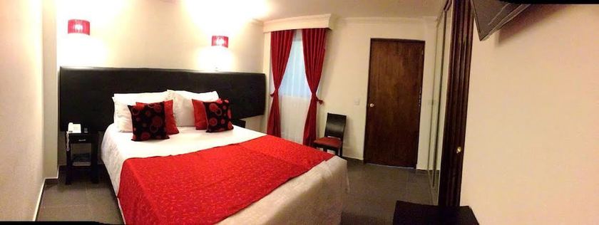 Imagen de la habitación del Hotel Boutique Feria Internacional. Foto 13