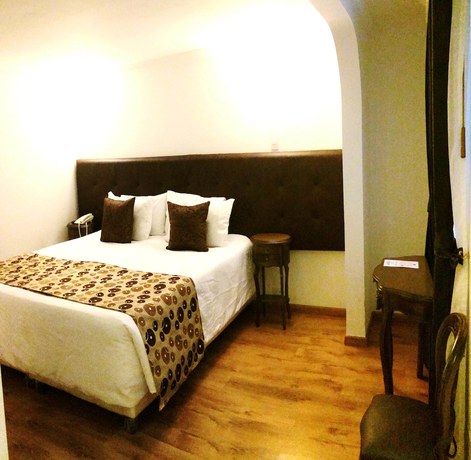 Imagen de la habitación del Hotel Boutique Feria Internacional. Foto 14