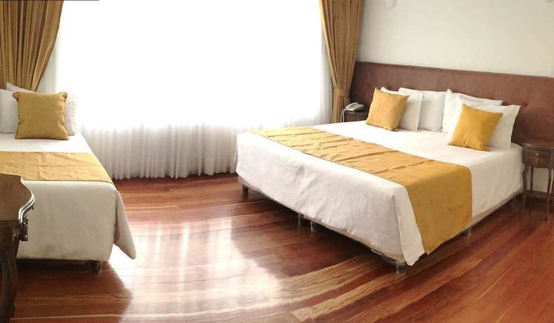 Imagen de la habitación del Hotel Boutique Feria Internacional. Foto 15