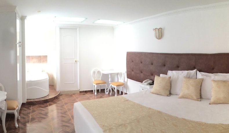 Imagen de la habitación del Hotel Boutique Feria Internacional. Foto 16