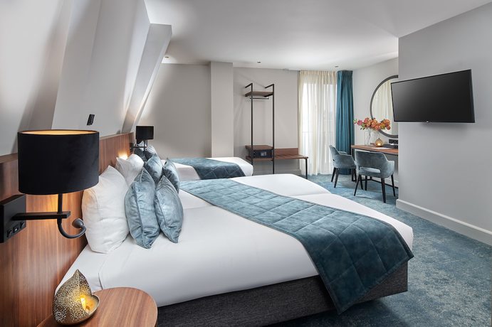 Imagen de la habitación del Hotel Boutique First City Den Haag. Foto 11