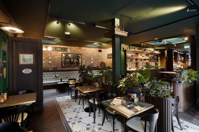 Imagen del bar/restaurante del Hotel Boutique First City Den Haag. Foto 5