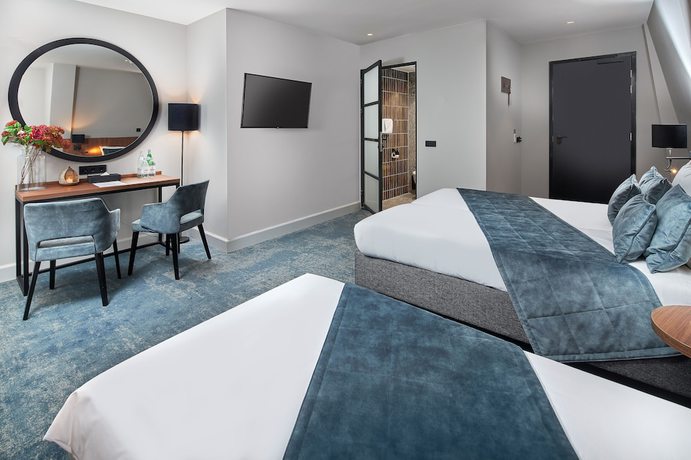 Imagen de la habitación del Hotel Boutique First City Den Haag. Foto 12