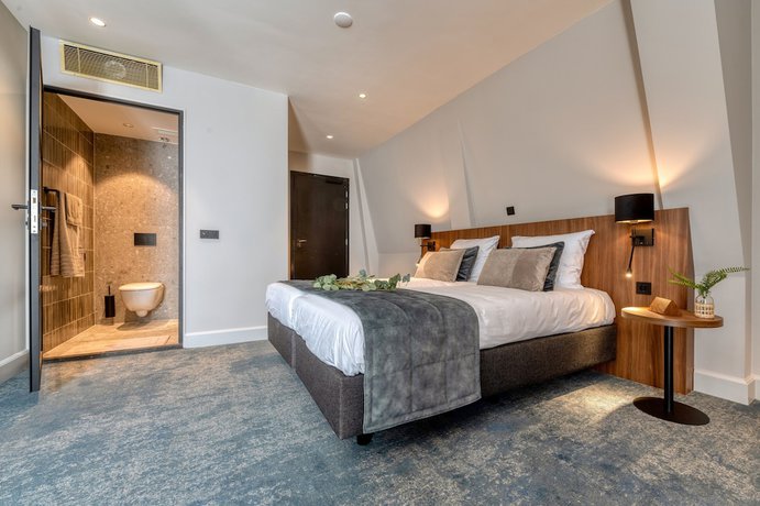 Imagen de la habitación del Hotel Boutique First City Den Haag. Foto 18