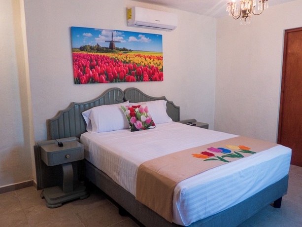 Imagen de la habitación del Hotel Boutique Flores y Gemas. Foto 7