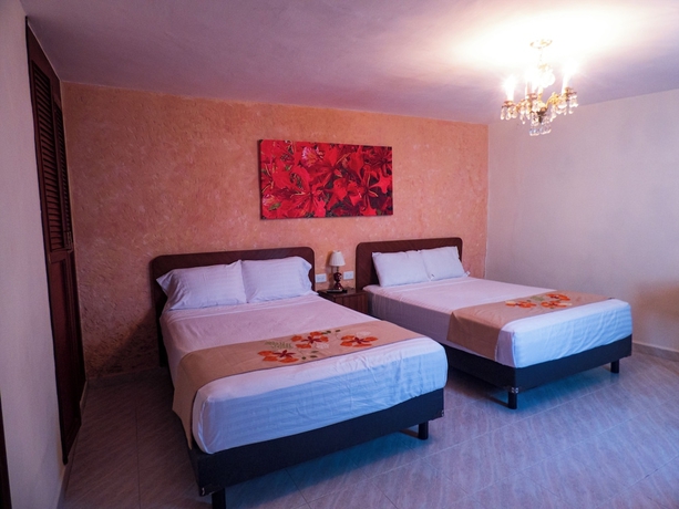 Imagen de la habitación del Hotel Boutique Flores y Gemas. Foto 11