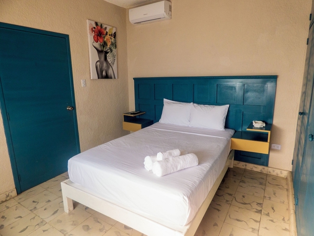 Imagen de la habitación del Hotel Boutique Flores y Gemas. Foto 14