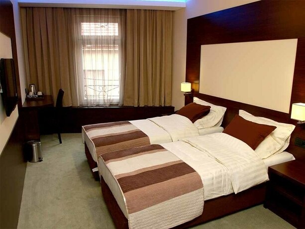 Imagen de la habitación del Hotel Boutique Golden Star. Foto 10