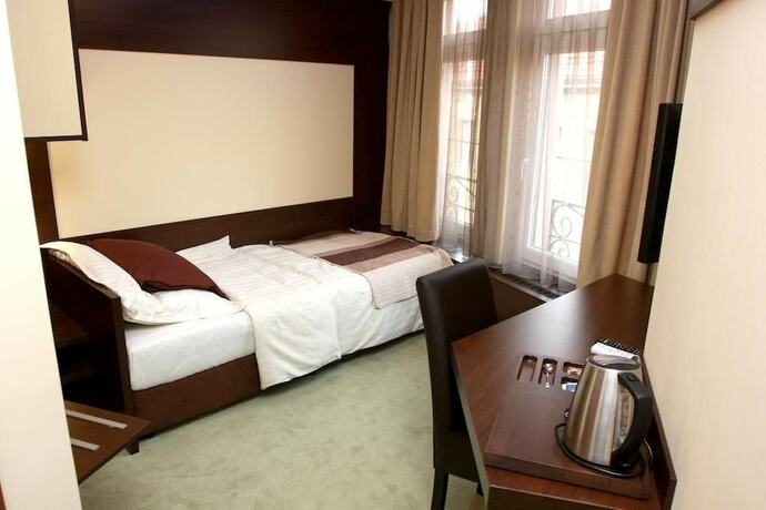 Imagen de la habitación del Hotel Boutique Golden Star. Foto 15