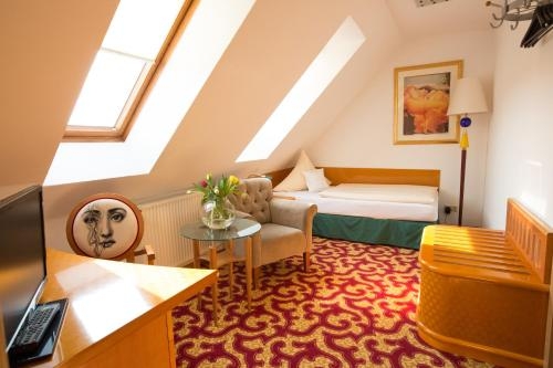 Imagen de la habitación del Hotel Boutique Goldene Henne. Foto 6