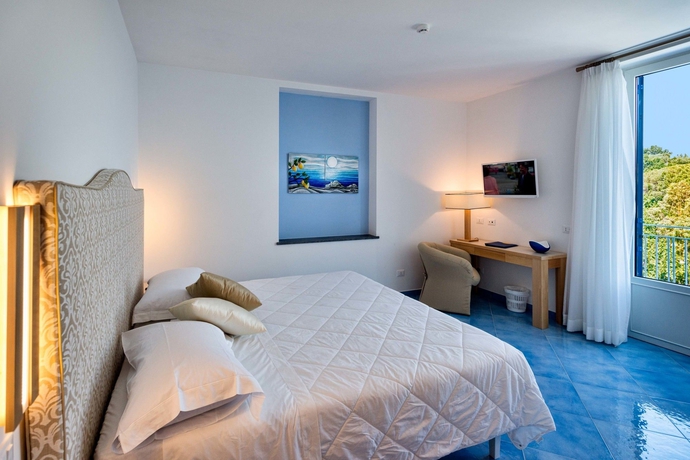 Imagen de la habitación del Hotel Boutique Helios. Foto 7