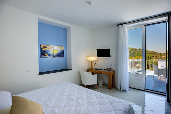 Imagen de la habitación del Hotel Boutique Helios. Foto 8