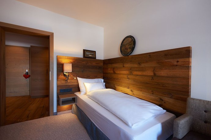 Imagen de la habitación del Hotel Boutique Herzhof Garni - Apartments. Foto 12