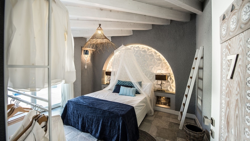Imagen de la habitación del Hotel Boutique Hotel Capo Blu. Foto 11