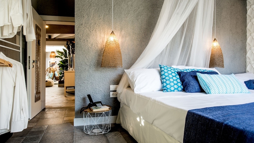 Imagen de la habitación del Hotel Boutique Hotel Capo Blu. Foto 12