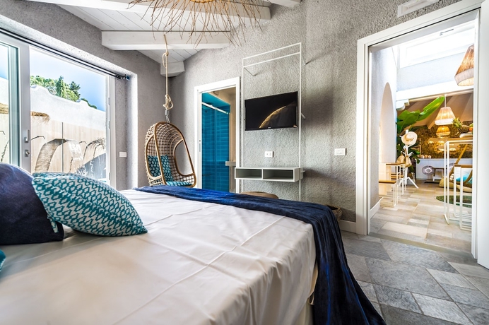 Imagen de la habitación del Hotel Boutique Hotel Capo Blu. Foto 13