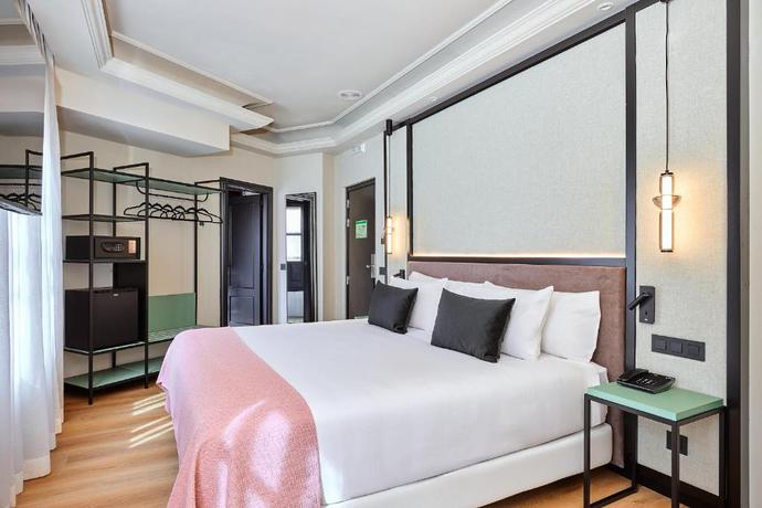 Imagen de la habitación del Hotel Boutique Hotel Luna Triunfo Granada. Foto 10