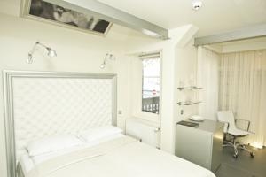 Imagen de la habitación del Hotel Boutique Hotel Mama. Foto 4