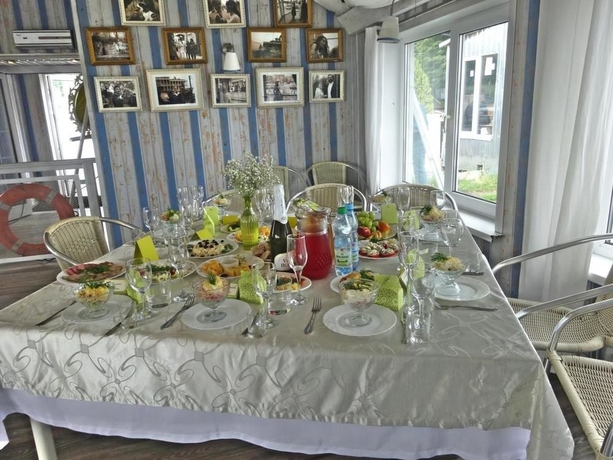 Imagen del bar/restaurante del Hotel Boutique Hotel Ostrovskiy Prichal. Foto 2