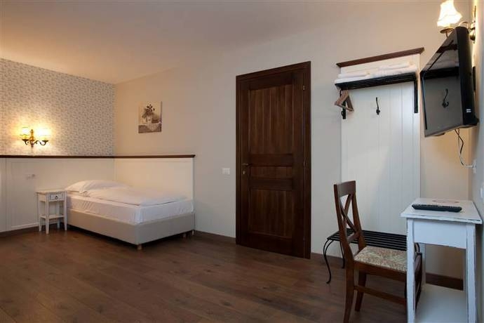 Imagen de la habitación del Hotel Boutique Hotel Piazzetta. Foto 7