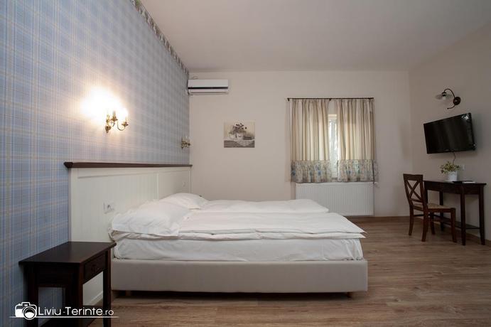 Imagen de la habitación del Hotel Boutique Hotel Piazzetta. Foto 8