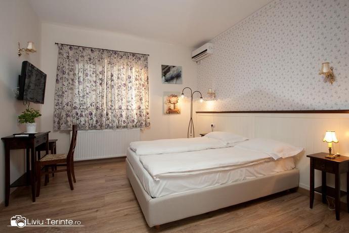 Imagen de la habitación del Hotel Boutique Hotel Piazzetta. Foto 9