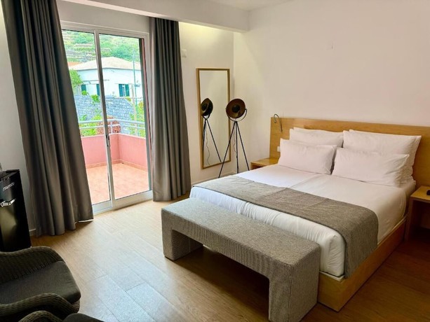 Imagen de la habitación del Hotel Boutique Jardim do Mar. Foto 10