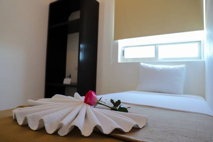 Imagen de la habitación del Hotel Boutique Kinyaah. Foto 13