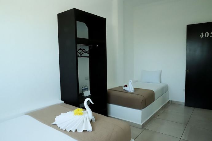 Imagen de la habitación del Hotel Boutique Kinyaah. Foto 14