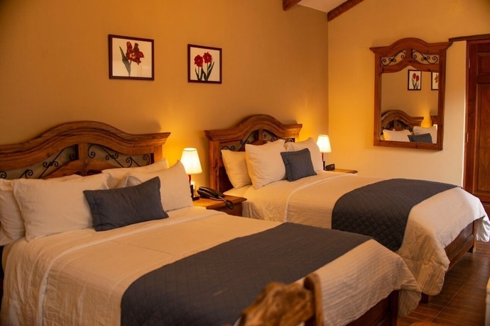 Imagen de la habitación del Hotel Boutique La Posada. Foto 8