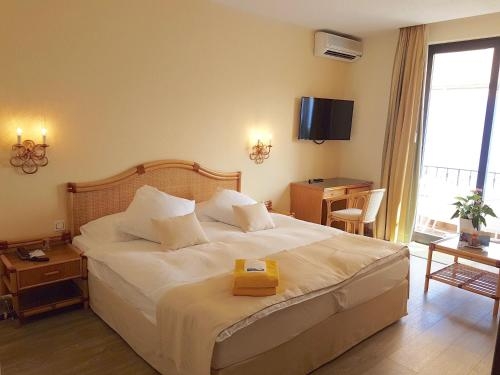 Imagen de la habitación del Hotel Boutique La Rocca. Foto 7