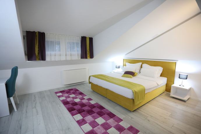 Imagen de la habitación del Hotel Boutique Libris. Foto 11