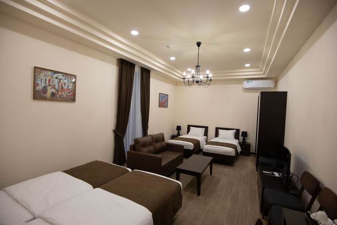 Imagen de la habitación del Hotel Boutique Living. Foto 7