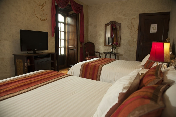 Imagen de la habitación del Hotel Boutique Los Balcones. Foto 17