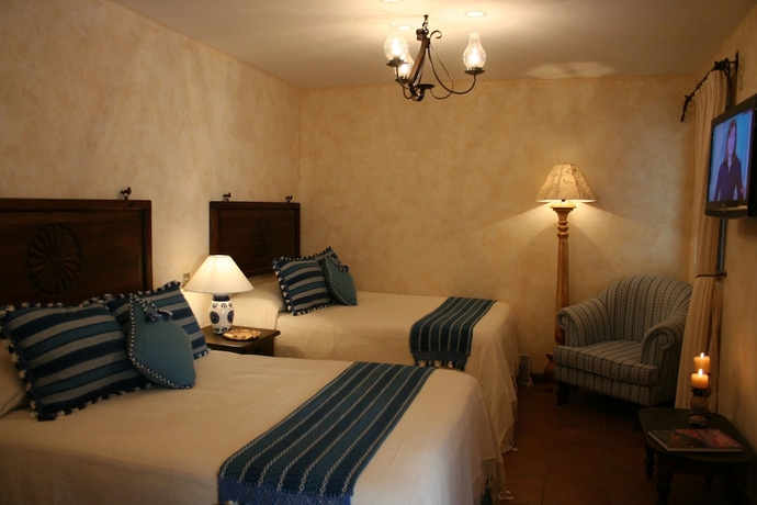 Imagen de la habitación del Hotel Boutique Los Pasos and Spa. Foto 9