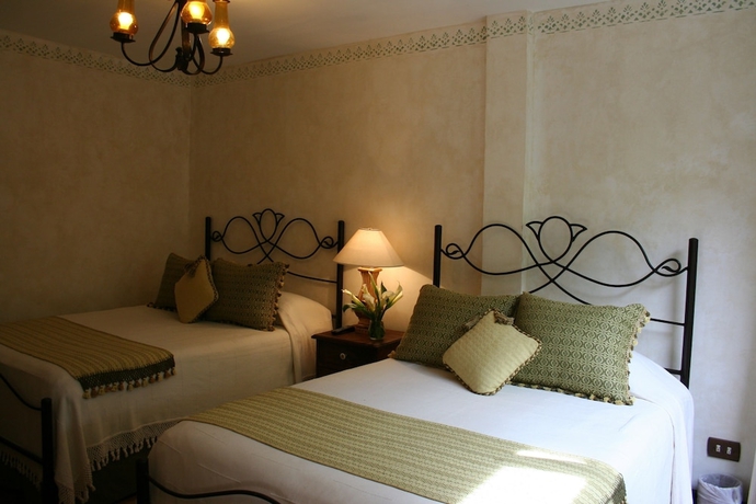 Imagen de la habitación del Hotel Boutique Los Pasos and Spa. Foto 12