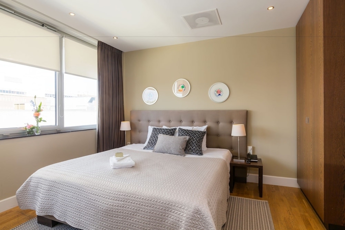 Imagen de la habitación del Hotel Boutique Lumière. Foto 12