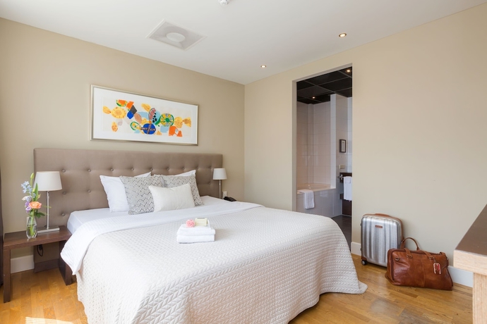 Imagen de la habitación del Hotel Boutique Lumière. Foto 17