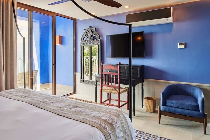 Imagen de la habitación del Hotel Boutique Luxury Patio Azul. Foto 11